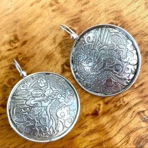 Silpada Asian-inspired sterling silver etched dragon disk earrings.